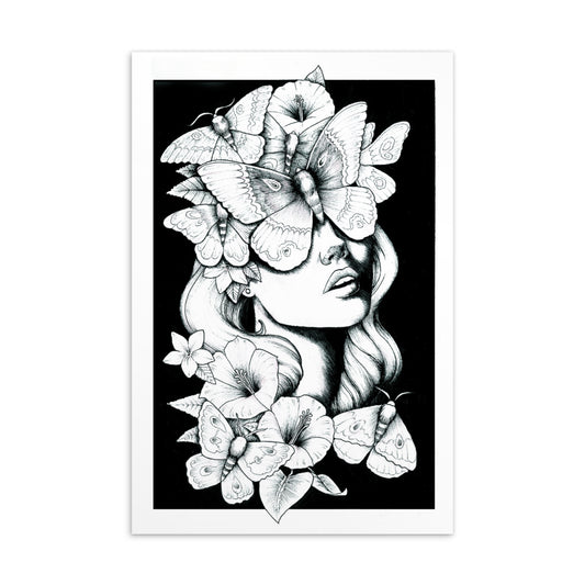 A black and white ink illustration of a woman's face surrounded by large moths and blooming hibiscus flowers against a solid black background. The moths cover her eyes, creating a surreal and mystical garden aesthetic.