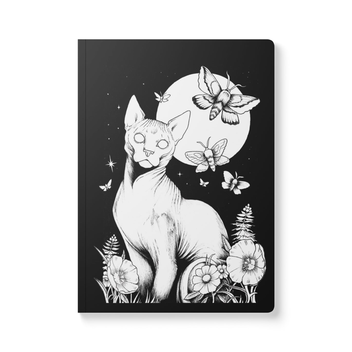 A front-facing view of a rectangular softcover journal with rounded corners, featuring a detailed black and white ink illustration. The design depicts a hairless Sphynx cat sitting among wildflowers and ferns under a large full moon and a starry night sky filled with flying moths.