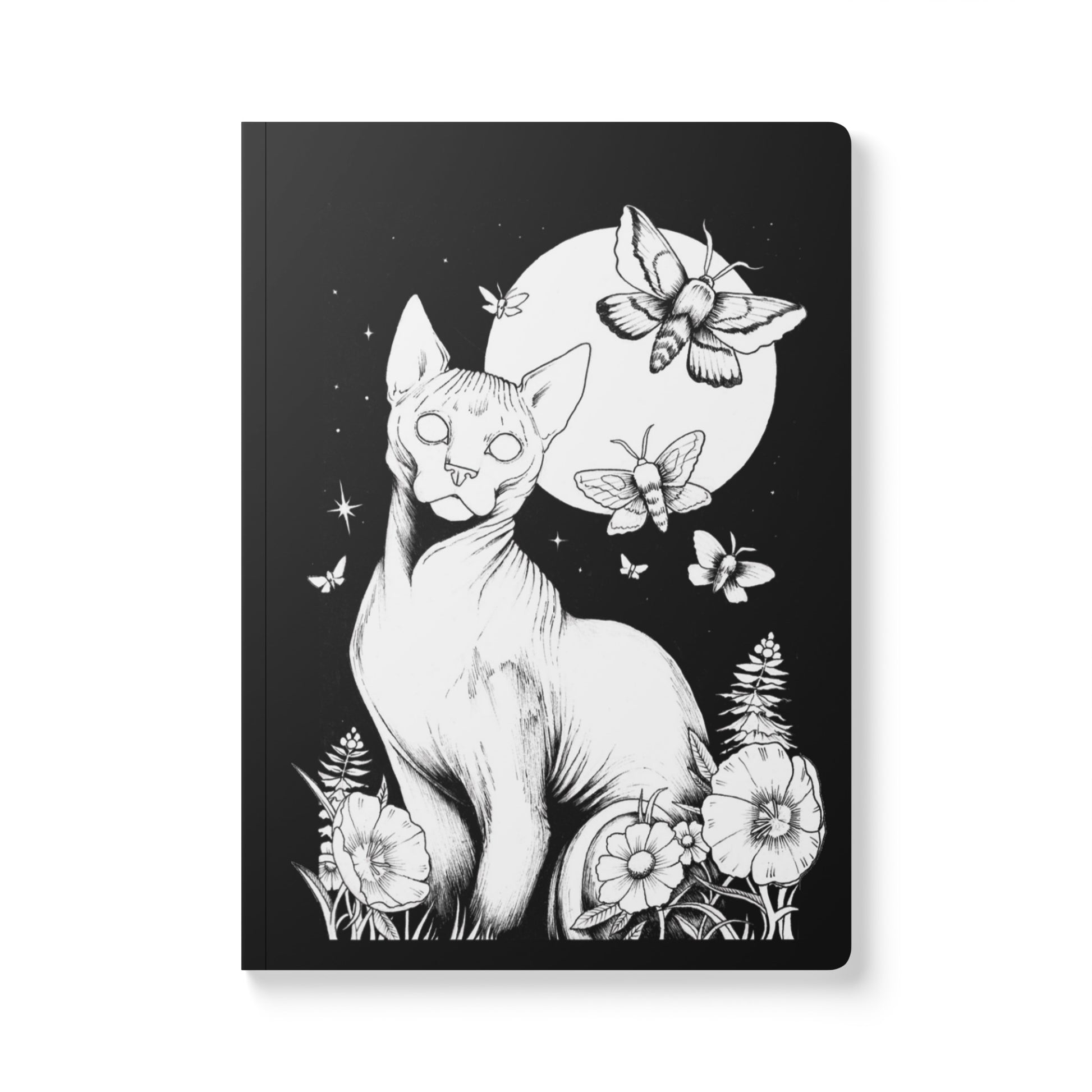 A front-facing view of a rectangular softcover journal with rounded corners, featuring a detailed black and white ink illustration. The design depicts a hairless Sphynx cat sitting among wildflowers and ferns under a large full moon and a starry night sky filled with flying moths.