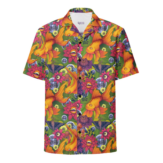 A short-sleeve, button-up camp shirt featuring a vibrant, surrealist pattern on a green background. The hand-drawn design includes large orange goldfish, shimmering silver disco balls, dark moths, psychedelic mushrooms, and pink flowers with human eyes and teeth.